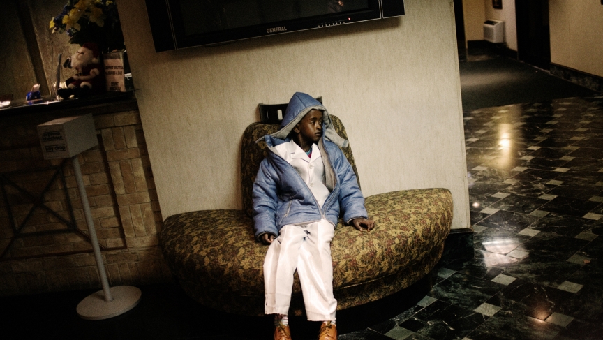 A Somali boy, a refugee, waits in a hotel lobby in Newark on December 11, 2009. He and his family would soon be assigned a room of their own and then begin their refugee resettlement process in the United States. A Somali boy, a refugee, waits in a hotel lobby in Newark on December 11, 2009. He and his family would soon be assigned a room of their own and then begin their refugee resettlement process in the United States.
