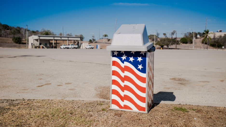 The Stars and Stripes on a Guantanamo trash can. The Stars and Stripes on a Guantanamo trash can.