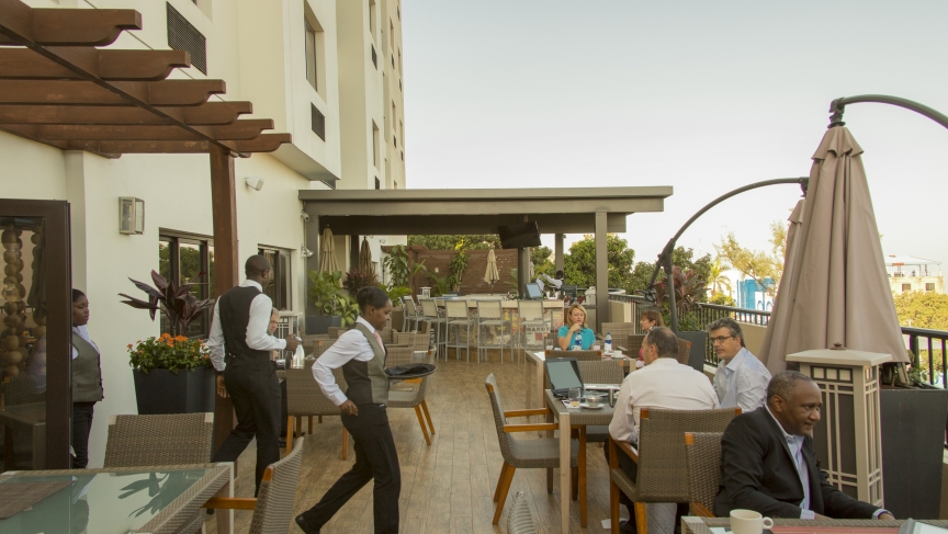 Guests enjoy outdoor dining at the Best Western Premier. Guests enjoy outdoor dining at the Best Western Premier.