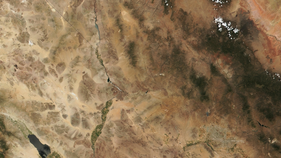 The Colorado River Delta, now the largely brown and speckled area in the lower left of this NASA photo, was once one of the largest and most biologically rich wetlands in North America, stretching from the borders of California, Arizona and the Mexican st