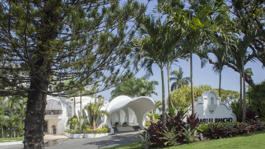 The luxurious El Rancho hotel sits on lush grounds in the city. The luxurious El Rancho hotel sits on lush grounds in the city.
