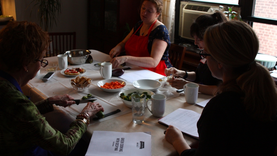 Chopping together at Despina's dining room table in New York City. Chopping together at Despina's dining room table in New York City.