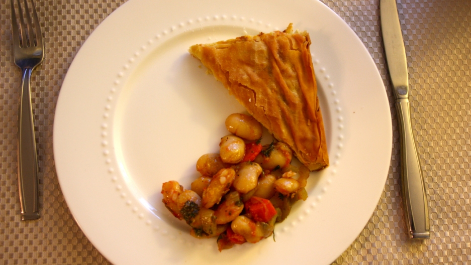 Tiropita (cheese pie) and Gigante Beans. Tiropita (cheese pie) and Gigante Beans.