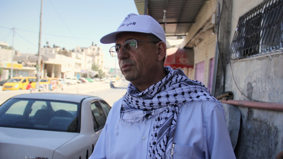 Mustafa Barghouthi, head of the Palestinian National Initiative, surveys the damage of at the Qalandiya checkpoint. Mustafa Barghouthi, head of the Palestinian National Initiative, surveys the damage of at the Qalandiya checkpoint.