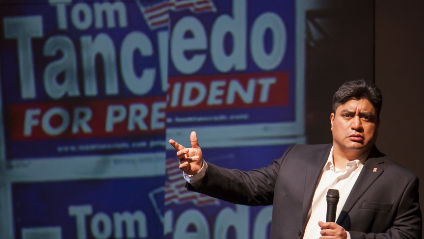 Actor Richard Azurdia plays the role of US Congressman Tom Tancredo, who made national name for himself and eventual 2008 run for president campaigning on stricter immigration controls. Actor Richard Azurdia plays the role of US Congressman Tom Tancredo, who made national name for himself and eventual 2008 run for president campaigning on stricter immigration controls.