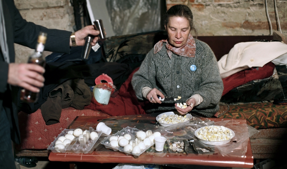 Egg salad for Passover in Drohobych, Ukraine. Loli Kantor remembers this method of cutting an egg in the palm of your hand from her youth. It's part of the Jewish life that she documented in Ukraine.