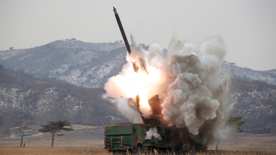 A new multiple launch rocket system is test fired in this undated photo released by North Korea's Korean Central News Agency (KCNA) in Pyongyang March 4, 2016. 