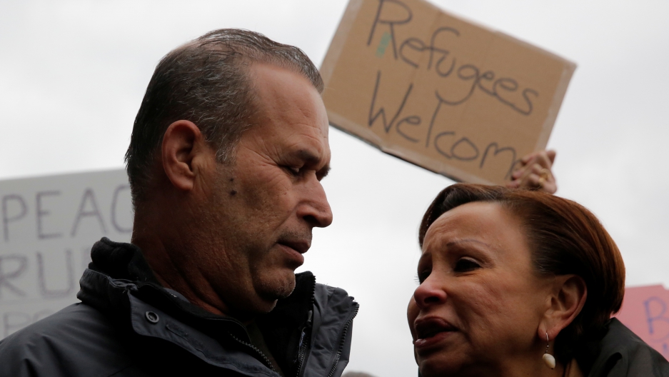 Man looking at woman