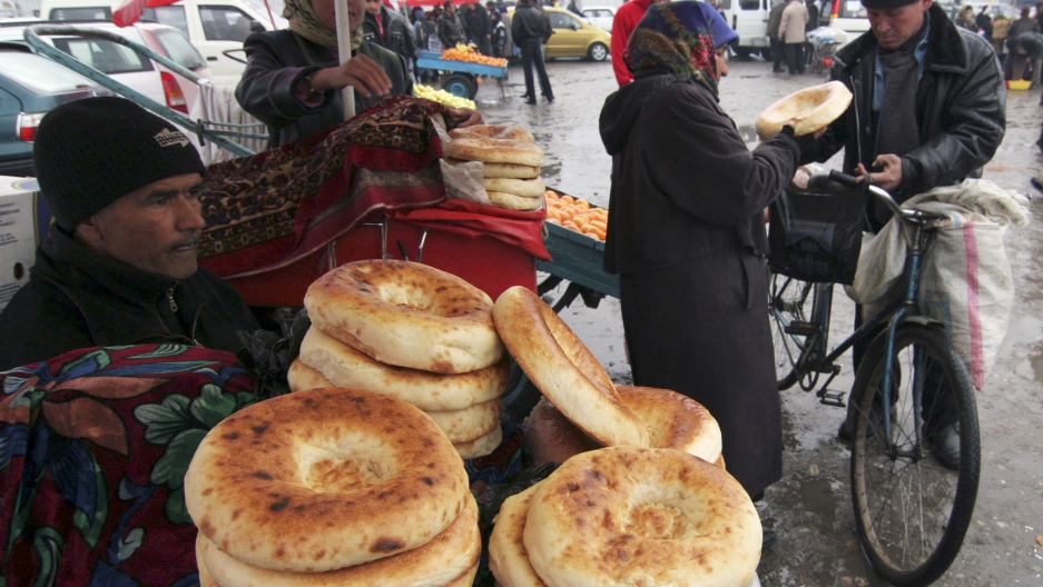 A man sells flat cakes in Dushanbe February 23, 2009.