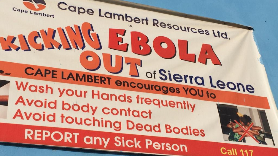 One of many banners around Freetown, Sierra Leone, warning people not to touch one another because of Ebola.