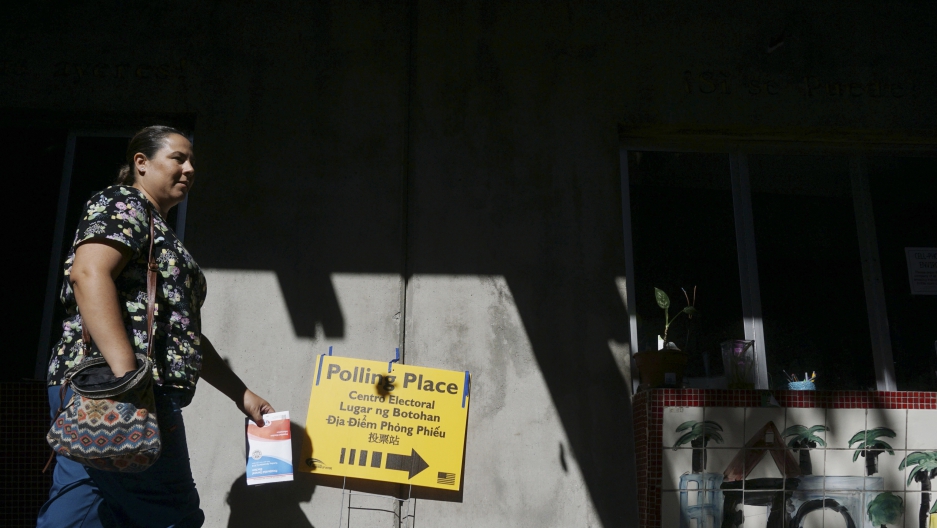 A voters arrives at a polling station