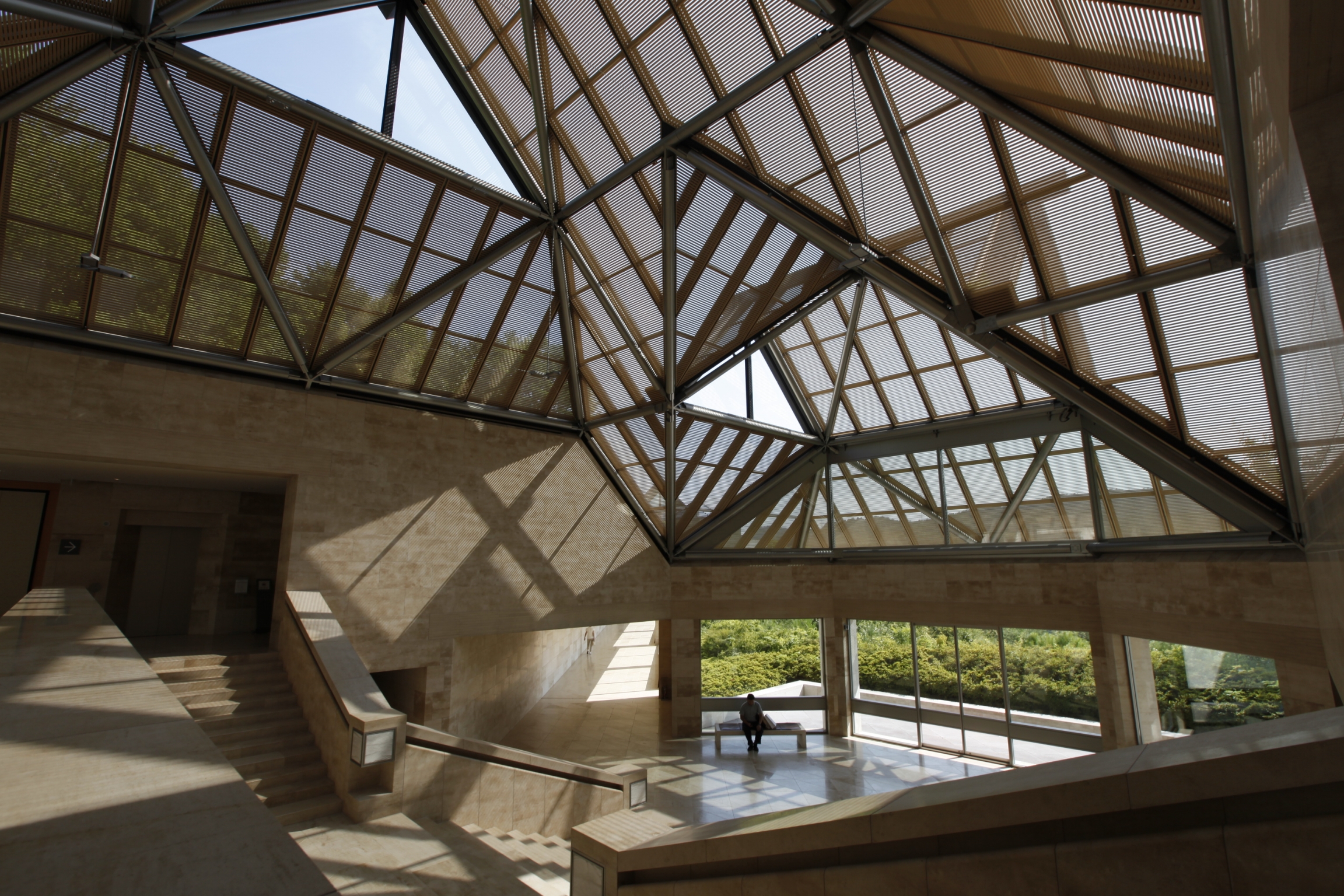 The Miho Museum is located southeast of Kyoto, Japan, and was opened in 1997. It features Japanese entrepreneur Mihoko Koyama's private collection of antiques from all around the world. The glass and naturally lit interior of the Miho Museum.