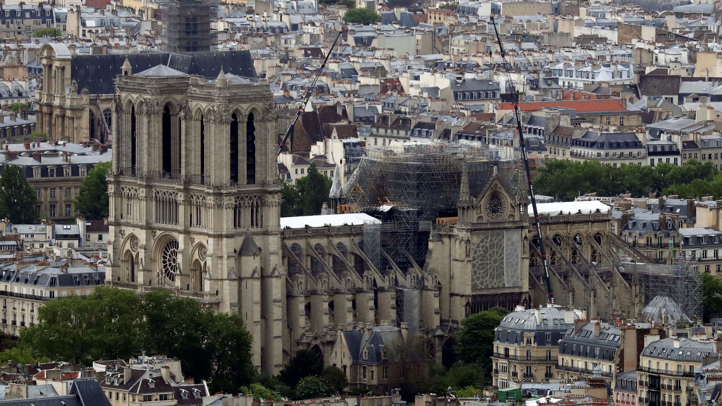 A view shows Notre-Dame Cathedral after a massive fire devastated large parts of the gothic structure. Notre Dame is shown in scaffolding after its recent fire.