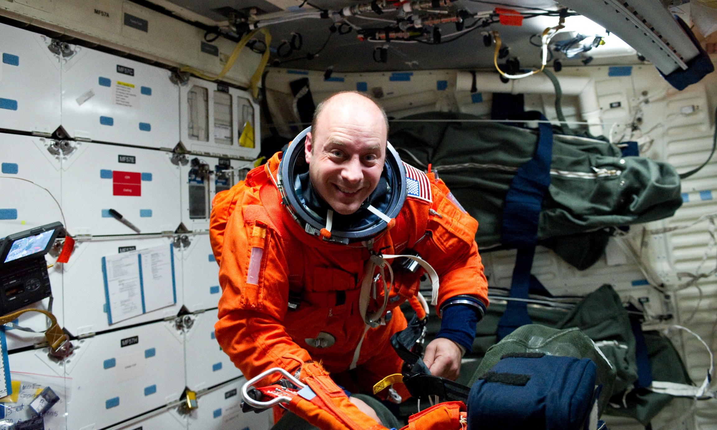 NASA astronaut Garrett Reisman on the middeck of the space shuttle Atlantis in 2010. NASA astronaut Garrett Reisman on the middeck of the space shuttle Atlantis in 2010.