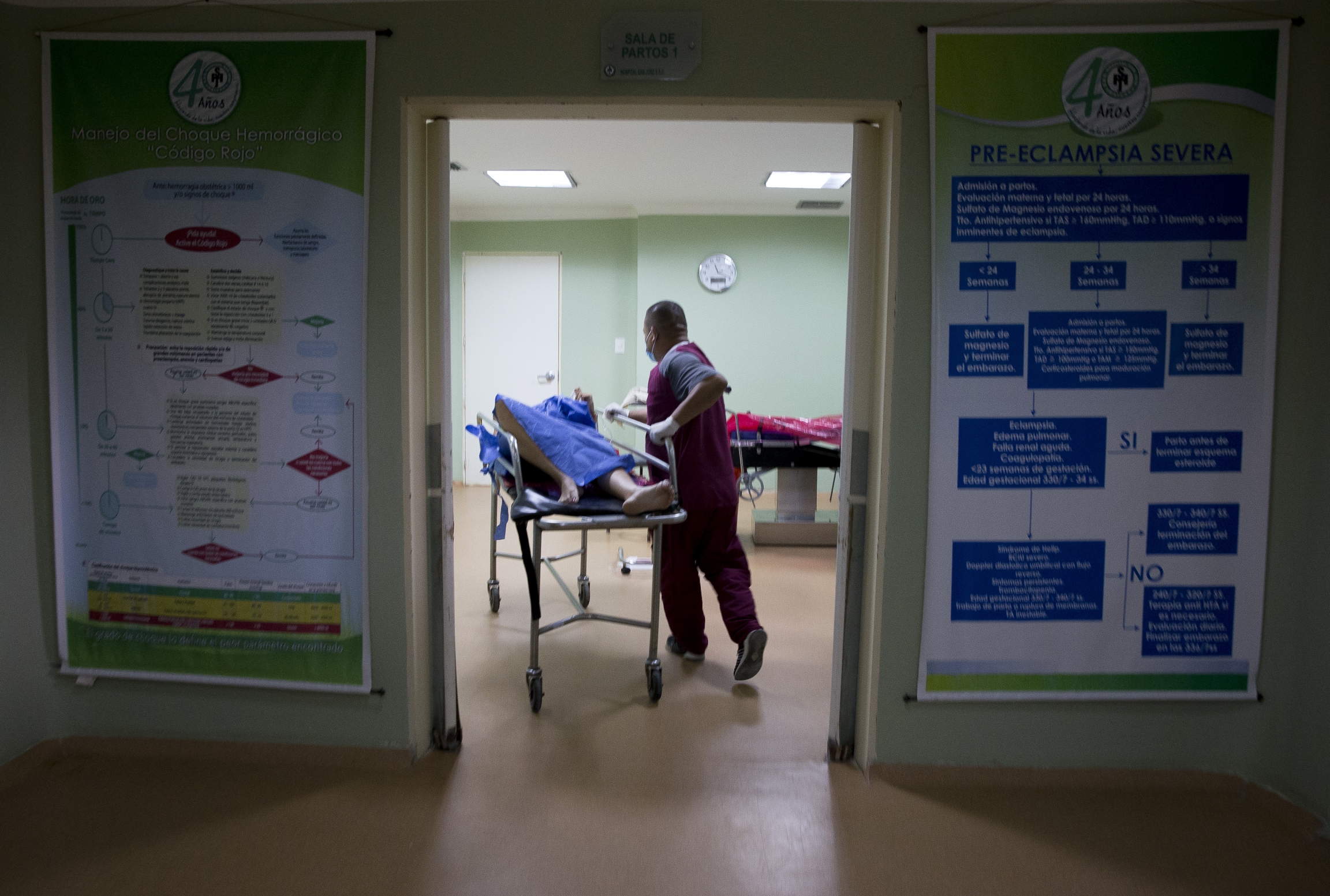 womam being wheeled into an ER