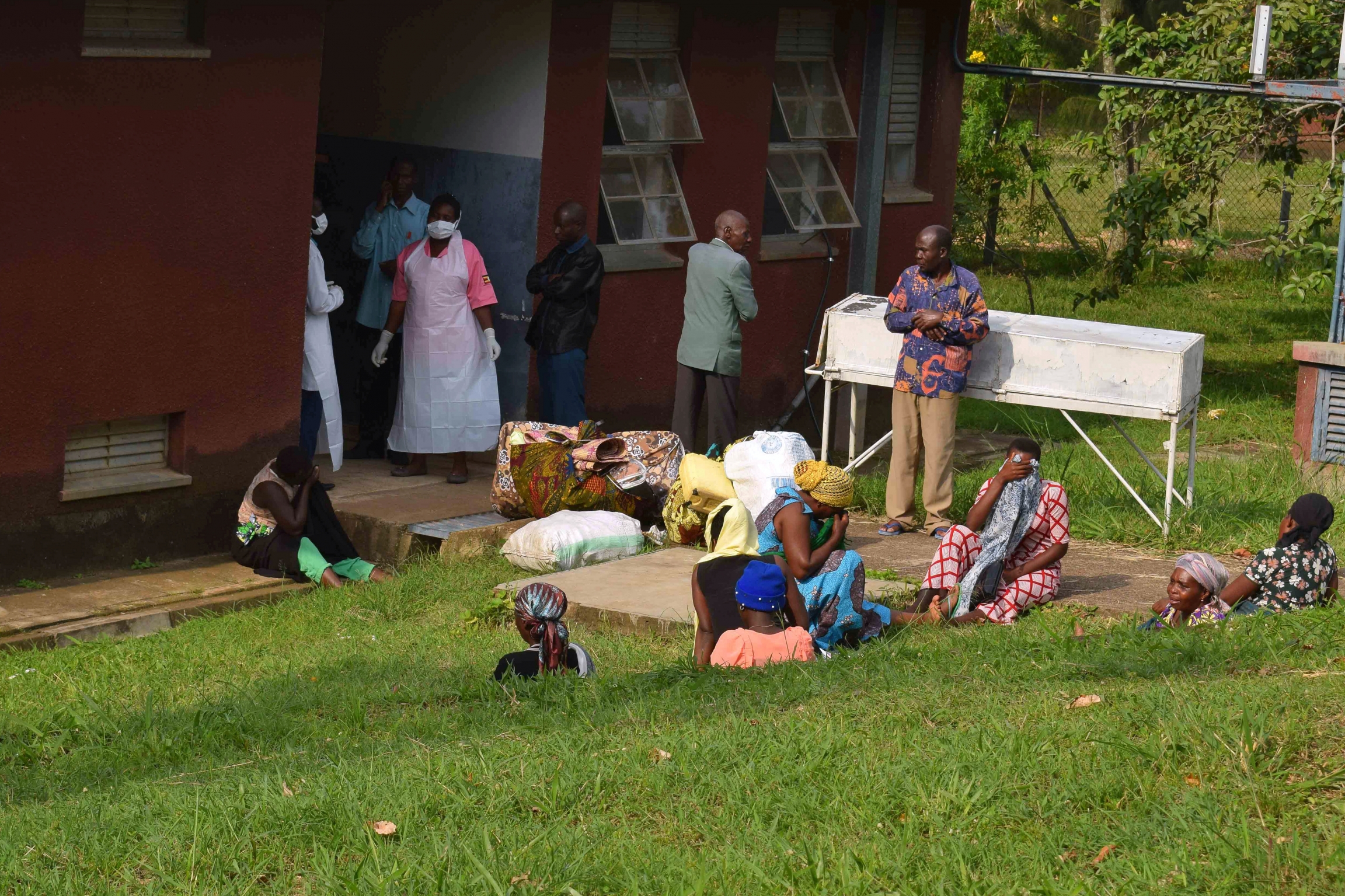 Bwera hospital medical staff stand outside prepping for Ebola patients.
