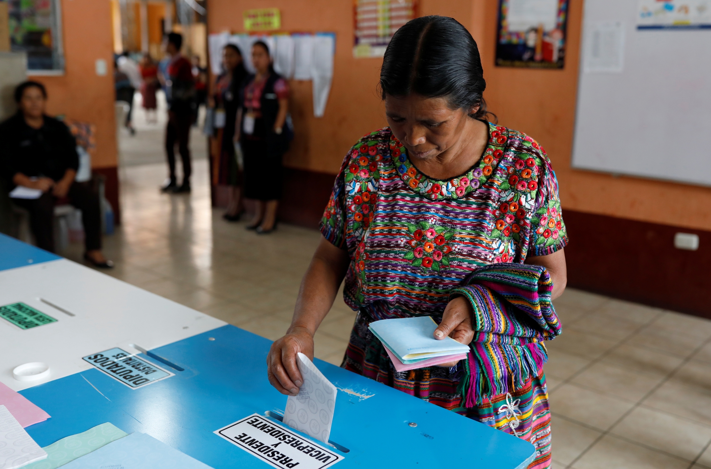 A woman votes at a polling station during the first round of Guatemala's presidential election in San Pedro Sacatepequez, Guatemala, June 16, 2019. A woman votes at a polling station during the first round of Guatemala's presidential election in San Pedro Sacatepequez, Guatemala, June 16, 2019.