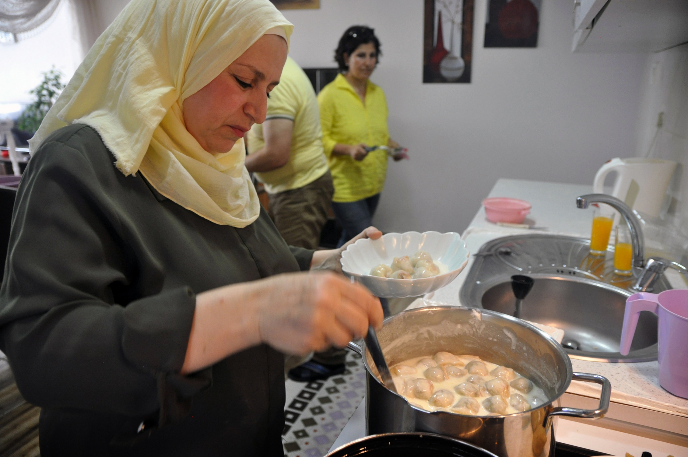 Husband And Wife Cooking Together Man And Woman In The Kitchen Free