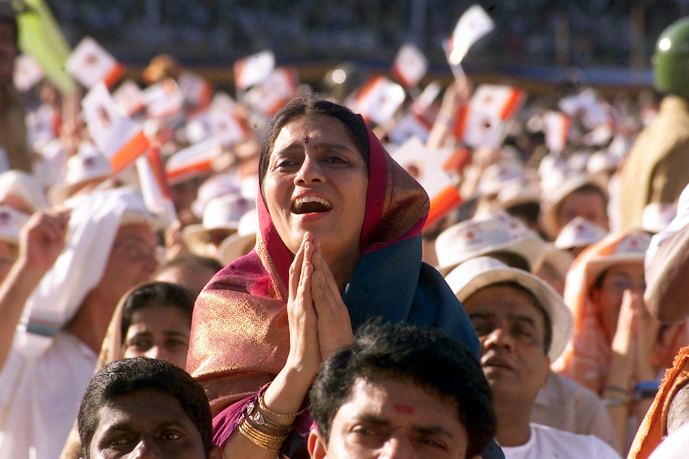 A woman exalts looking at a living god