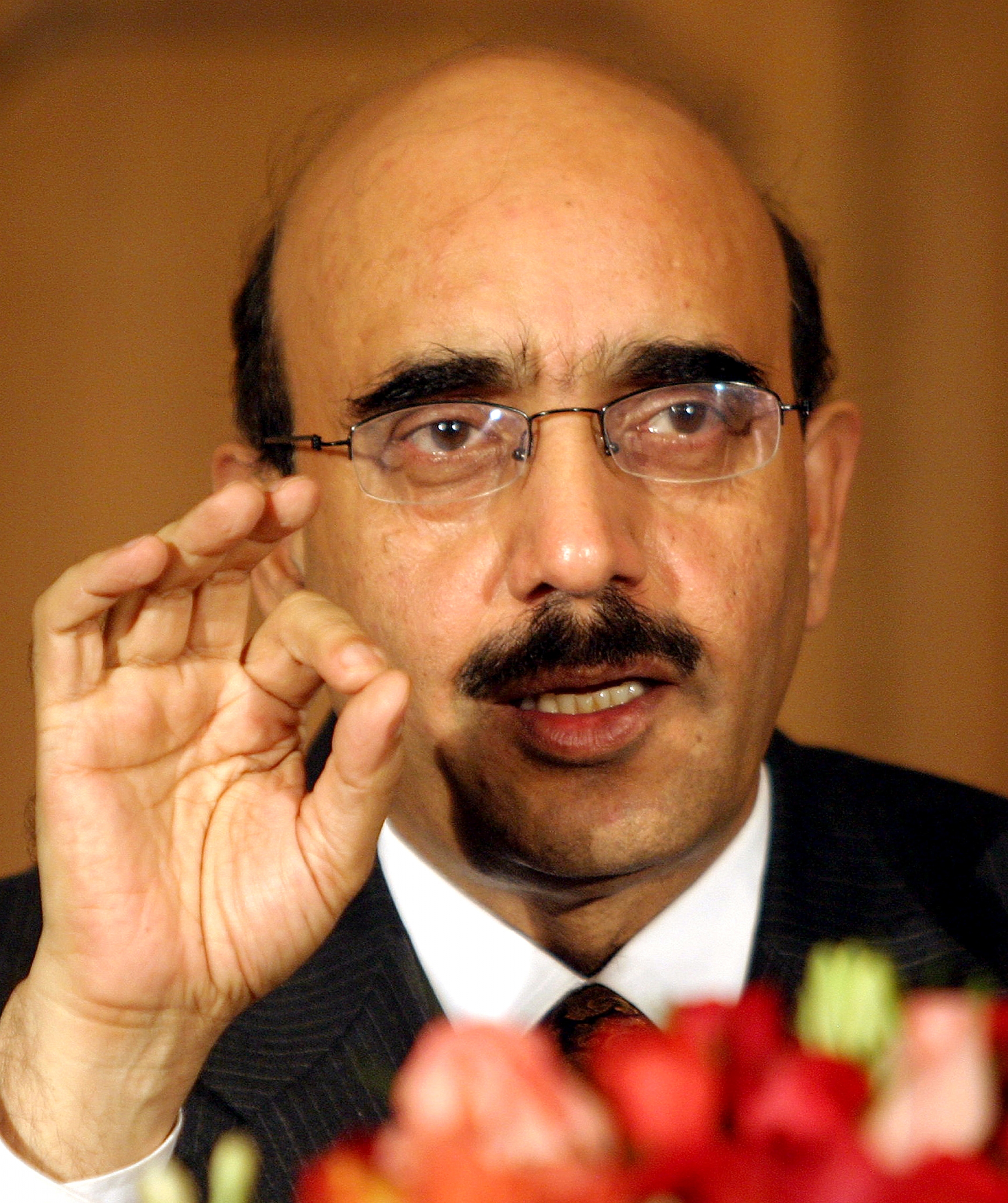 Sardar Masood Khan, president of the Pakistani side of divided Kashmir, gestures during a news conference at Pakistan's foreign ministry in Islamabad, December 23, 2004. Sardar Masood Khan, president of the Pakistani side of divided Kashmir, gestures during a news conference at Pakistan's foreign ministry in Islamabad, December 23, 2004.