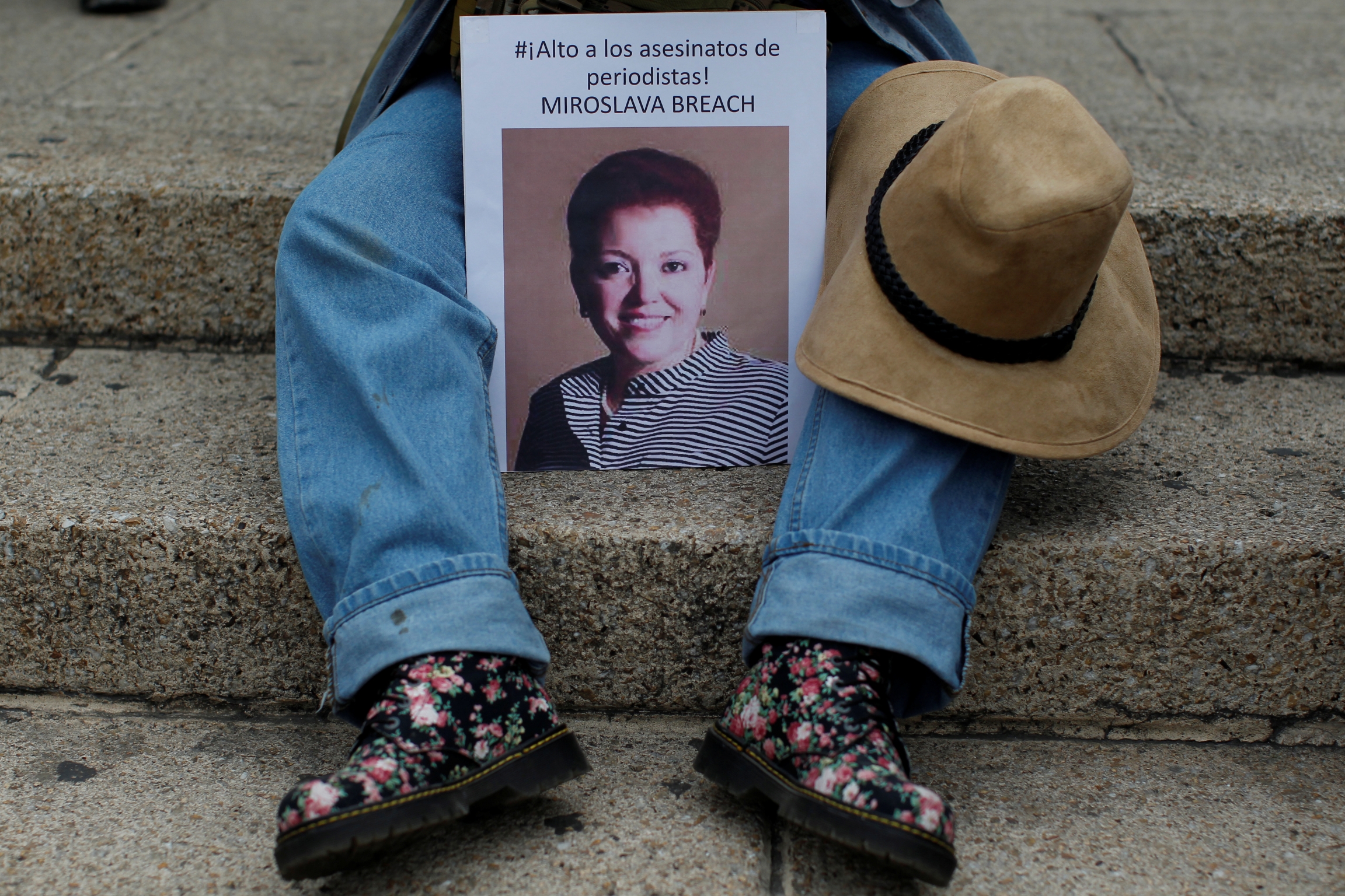 A picture of the Mexican journalist Miroslava Breach is seen during a protest against the murder of Miroslava, in Mexico City, Mexico March 25, 2017. Picture reads "Stop the murders of Journalists" A picture of the Mexican journalist Miroslava Breach is seen during a protest against the murder of Miroslava, in Mexico City, Mexico March 25, 2017. Picture reads "Stop the murders of Journalists."