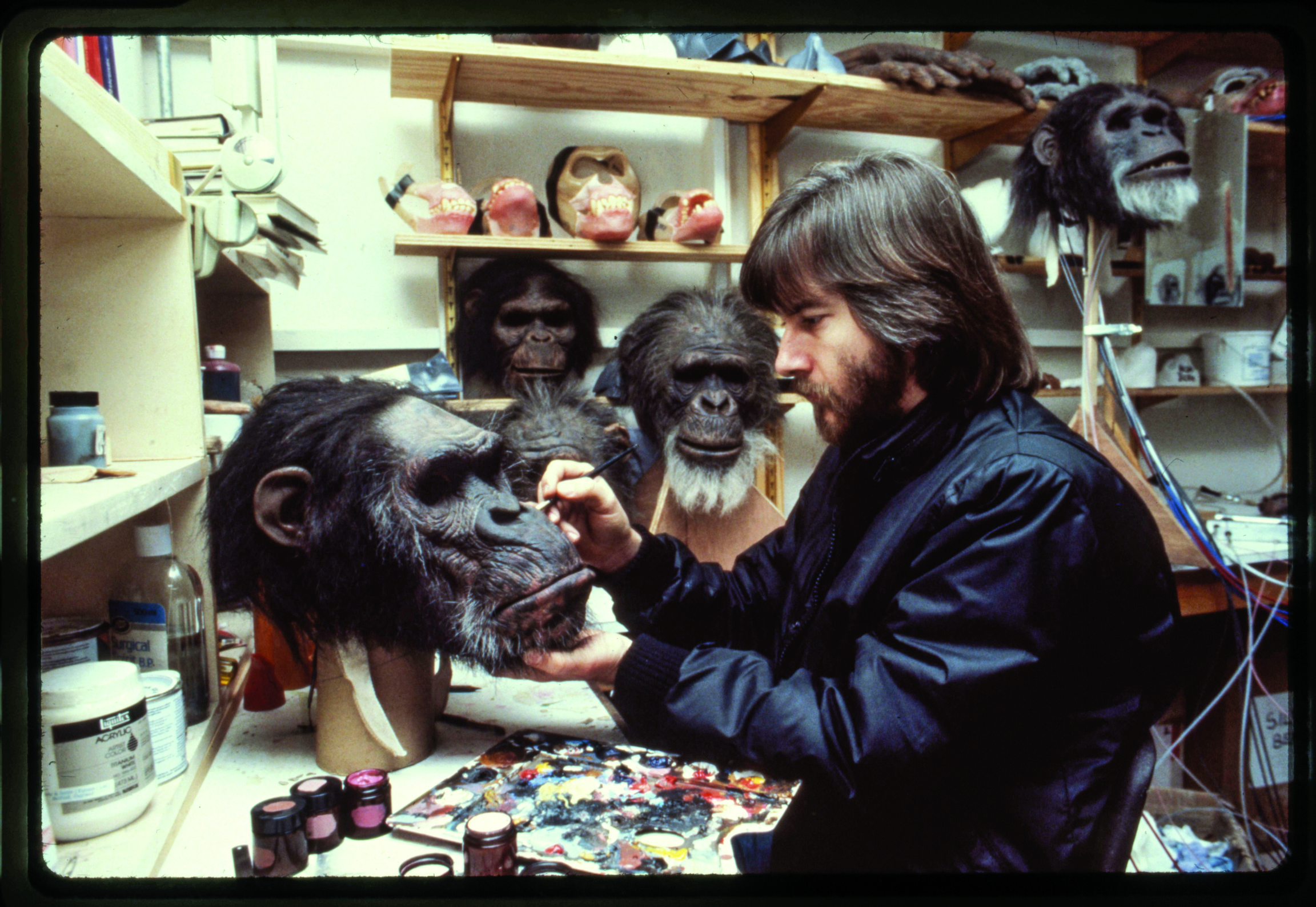 Rick Baker in his workshop on Stage 5 at Elstree Studios, touching up the paint on White Eyes, from the movie “Greystoke: The Legend of Tarzan, Lord of the Apes.” Rick Baker in his workshop on Stage 5 at Elstree Studios, touching up the paint on White Eyes, from the movie “Greystoke: The Legend of Tarzan, Lord of the Apes.”