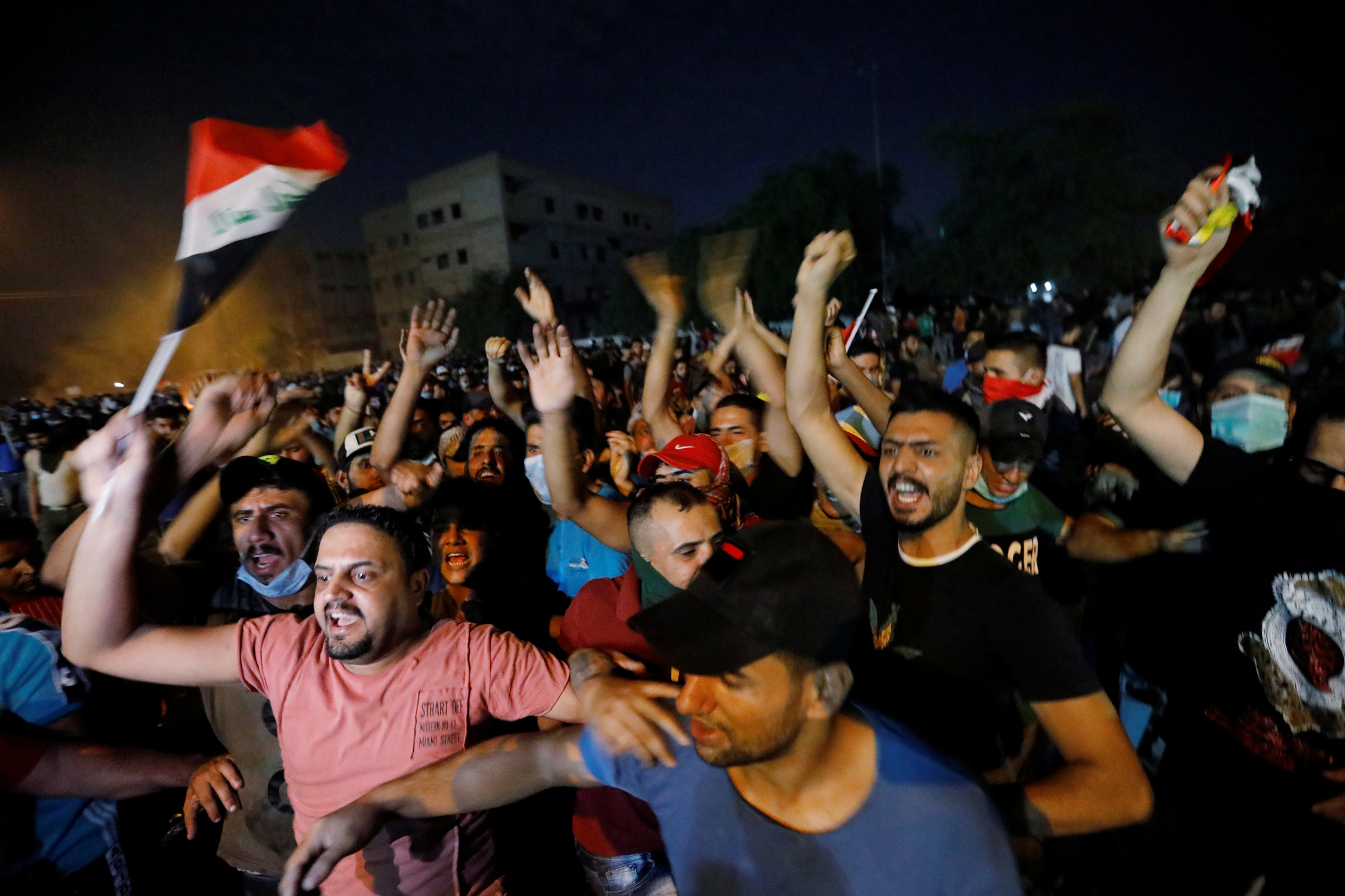 Demonstrators gathered at a protest during a curfew, two days after the nationwide anti-government protests turned violent, in Baghdad, Iraq, on Oct. 3, 2019. Demonstrators gathered at a protest during a curfew, two days after the nationwide anti-government protests turned violent, in Baghdad, Iraq, on Oct. 3, 2019.