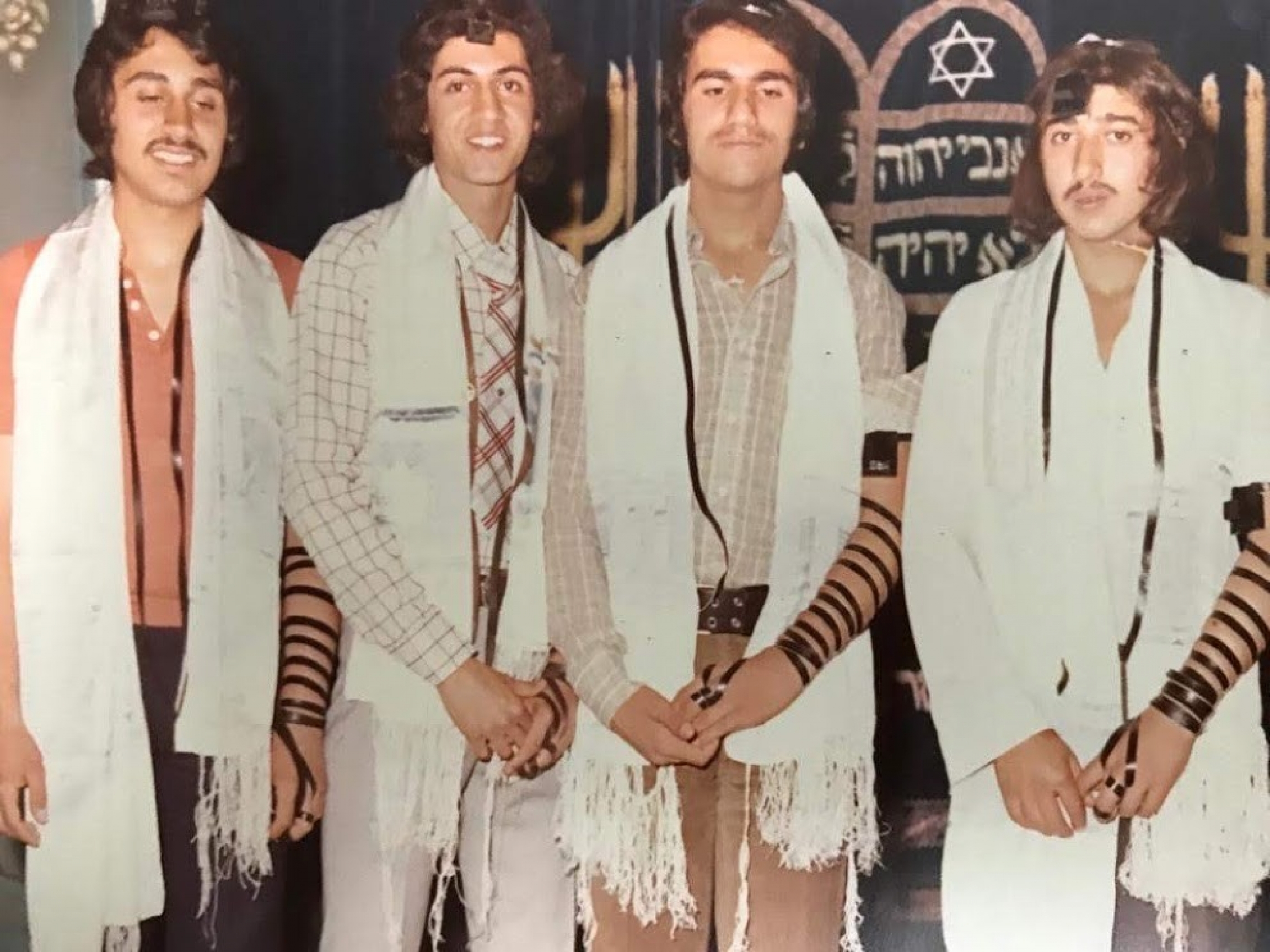 The reunion slideshow included photos of Jewish students in pre-revolution Iran. At the time, Ettefagh School had a synagogue, where both Jewish and non-Jewish students attended morning prayers together. Reunion slideshow