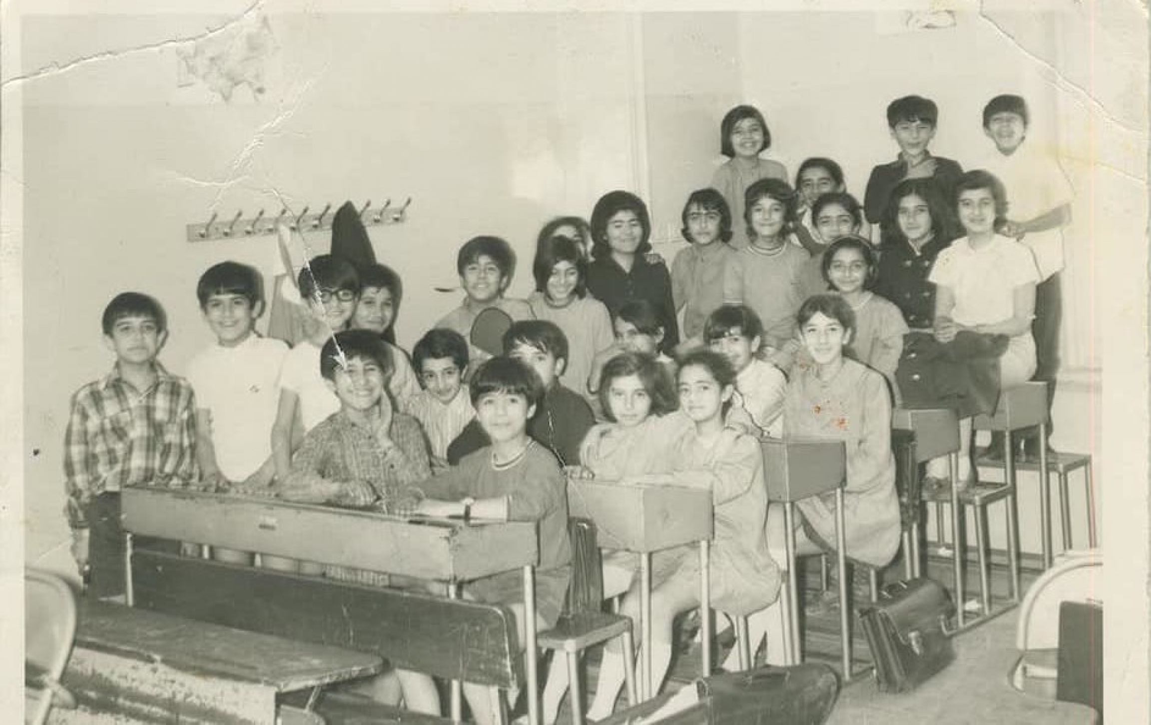 Old black-and-white photos from Ettefagh School were projected during the class of '77 reunion on Sept. 1, 2019. Old black-and-white photos