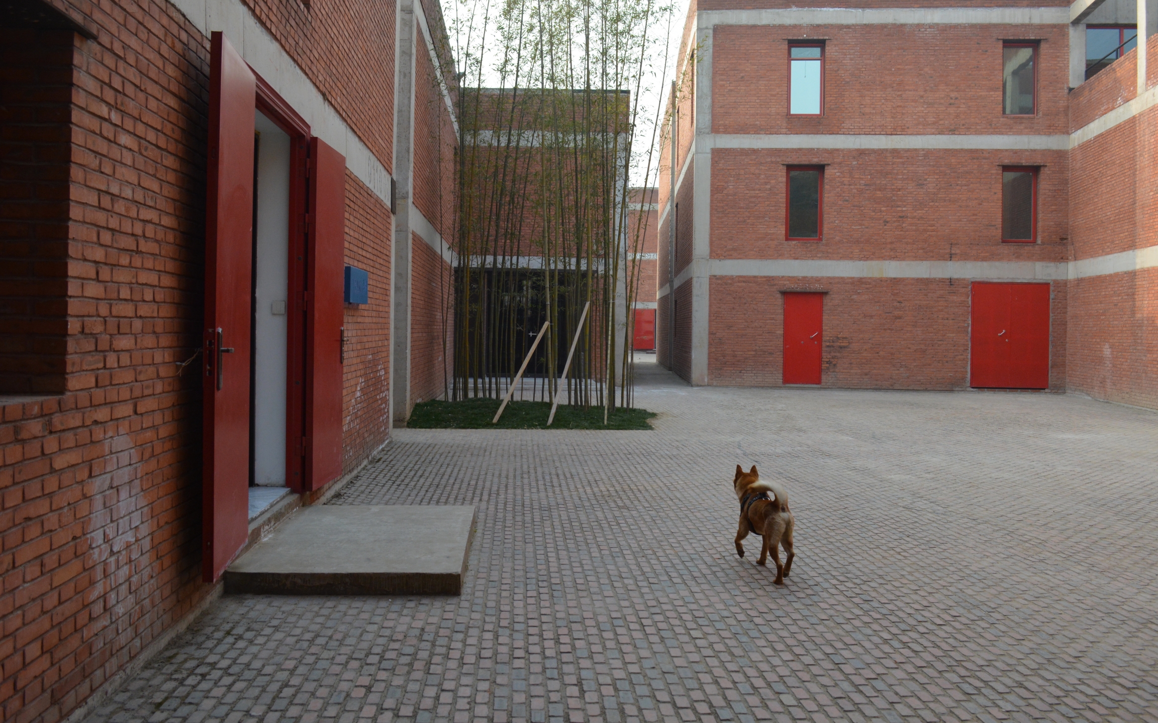 Brick building containing galleries in Caochangdi. Brick buildings containing galleries