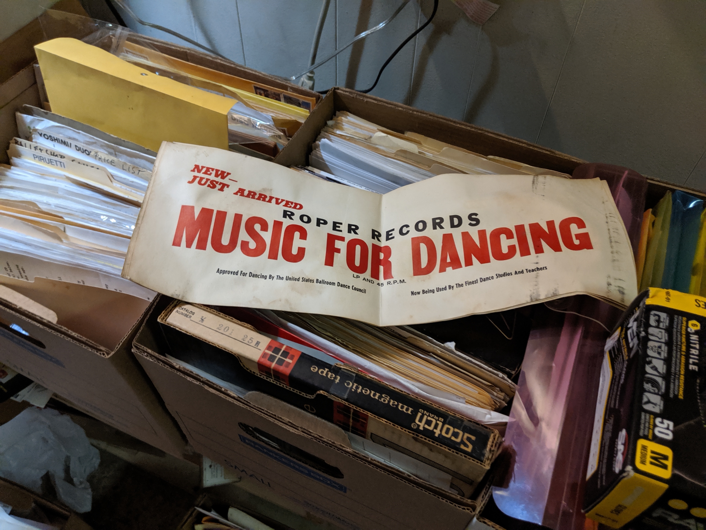 A Roper Records banner over filing boxes. The banner reads "music for dancing."