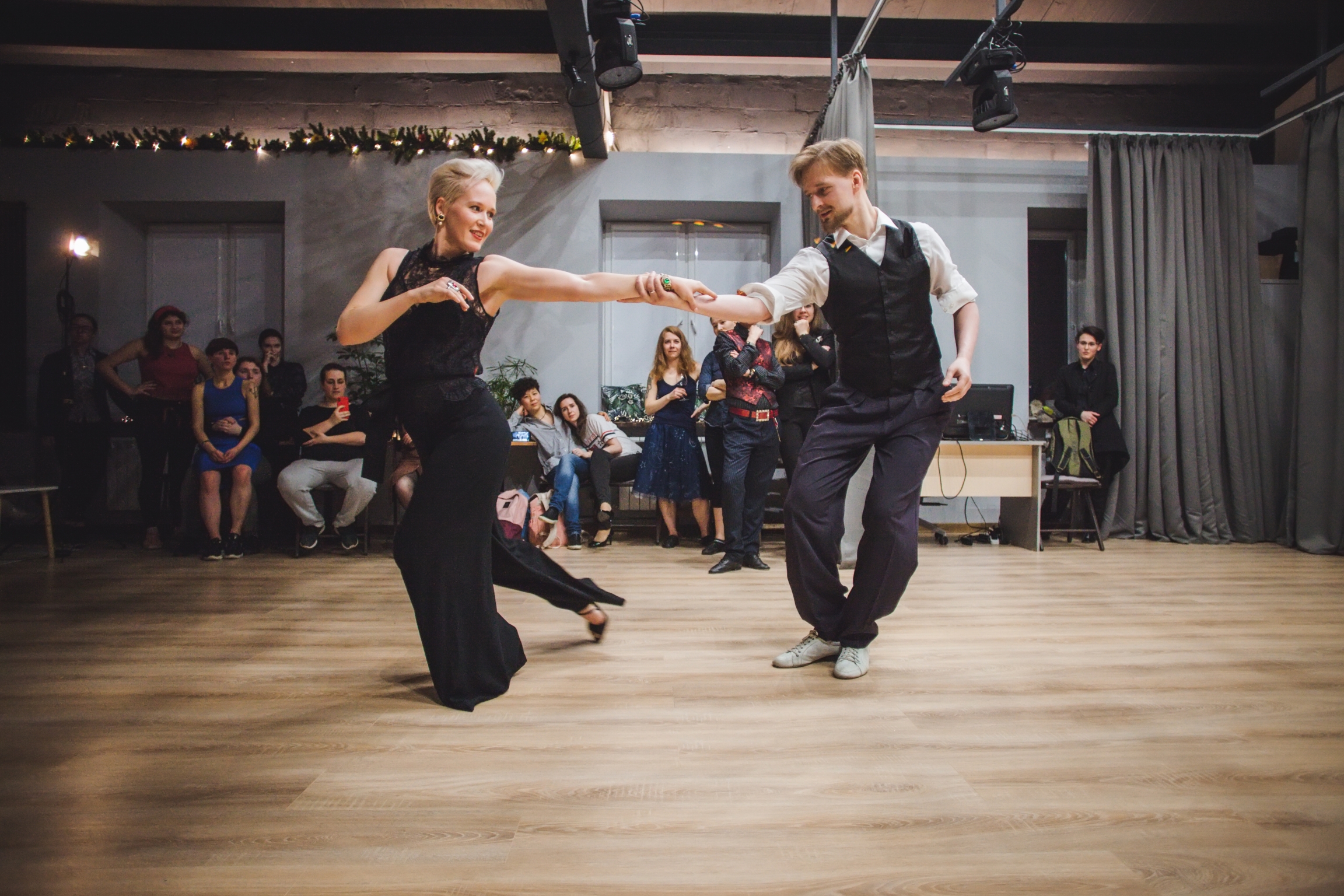 Two people show off their dance moves during the queer dance festival held in Moscow, Russia. Two people dance at a studio together
