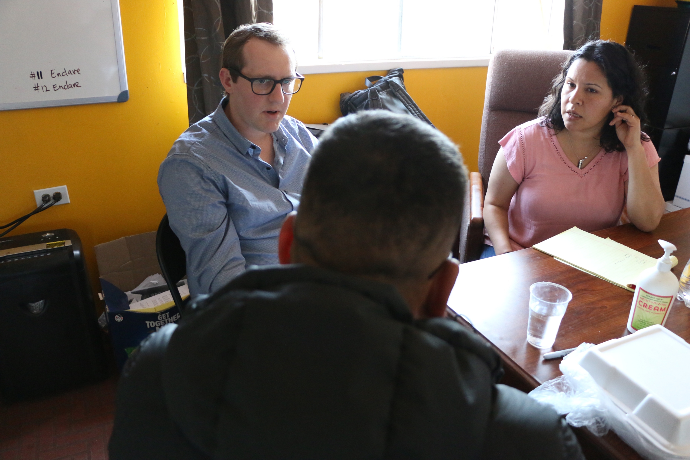 Matthew Weisner, left, meets with his client, known in a federal lawsuit as Gregory Doe, in Tijuana, Mexico.