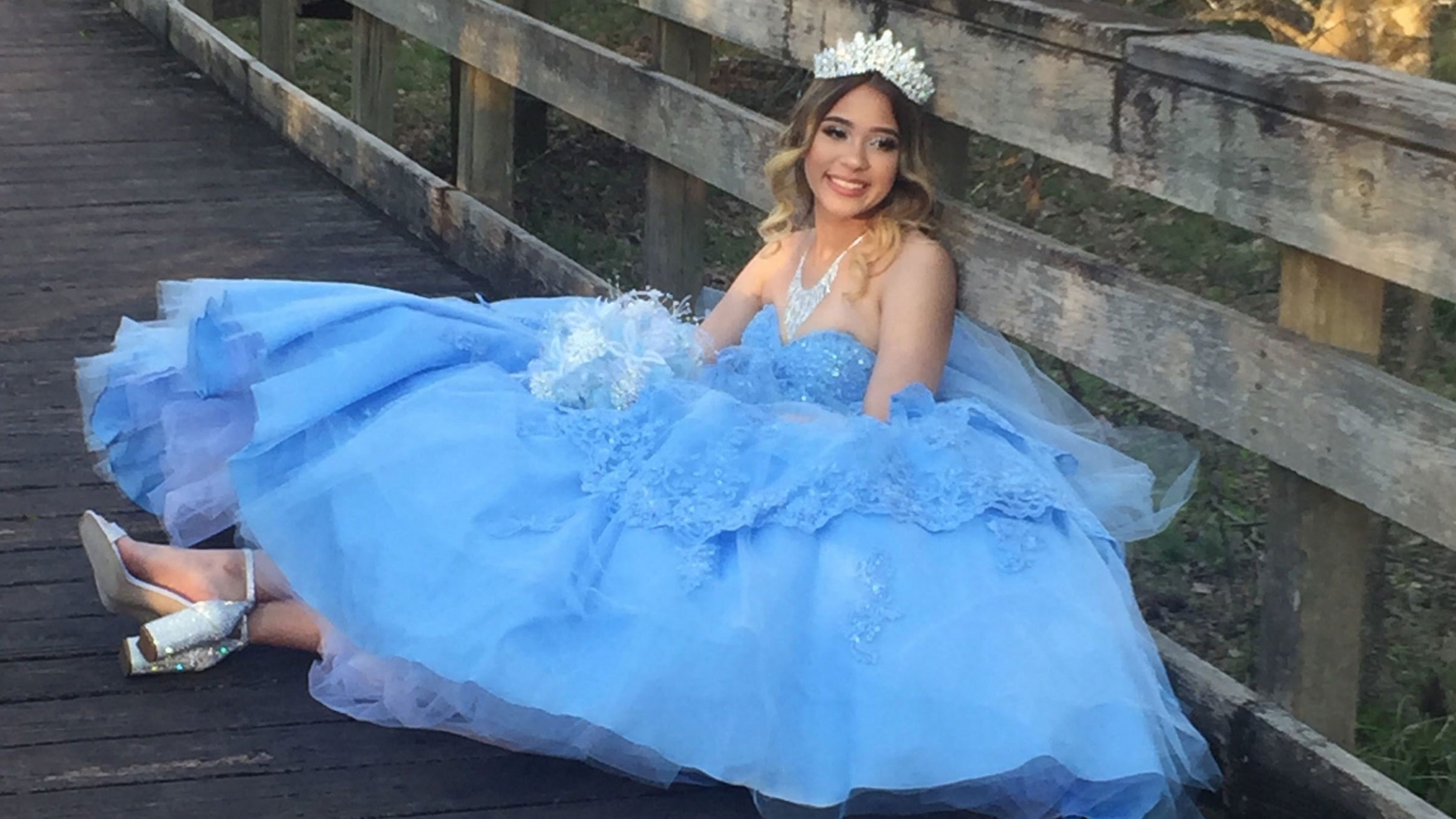 Katelynn Taveras, a teenager in Houston, Texas, poses in the dress she selected for her quinceañera. The party was canceled due to the coronavirus outbreak. Katelynn Taveras, a teenager in Houston, Texas, poses in the pale-blue dress she selected for her quinceañera. The party was canceled due to the coronavirus outbreak.