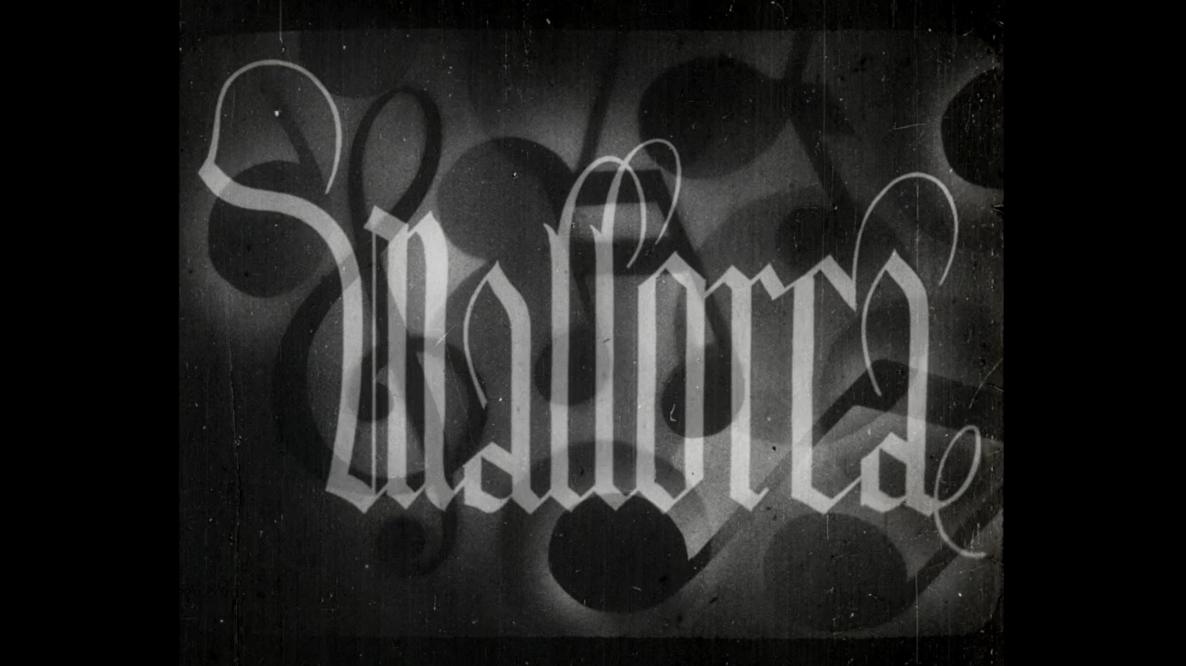 "Mallorca" was produced sometime between 1932-1934, making it the first talking film directed by a woman in Spain. The word Mallorca in gothic lettering in black and white