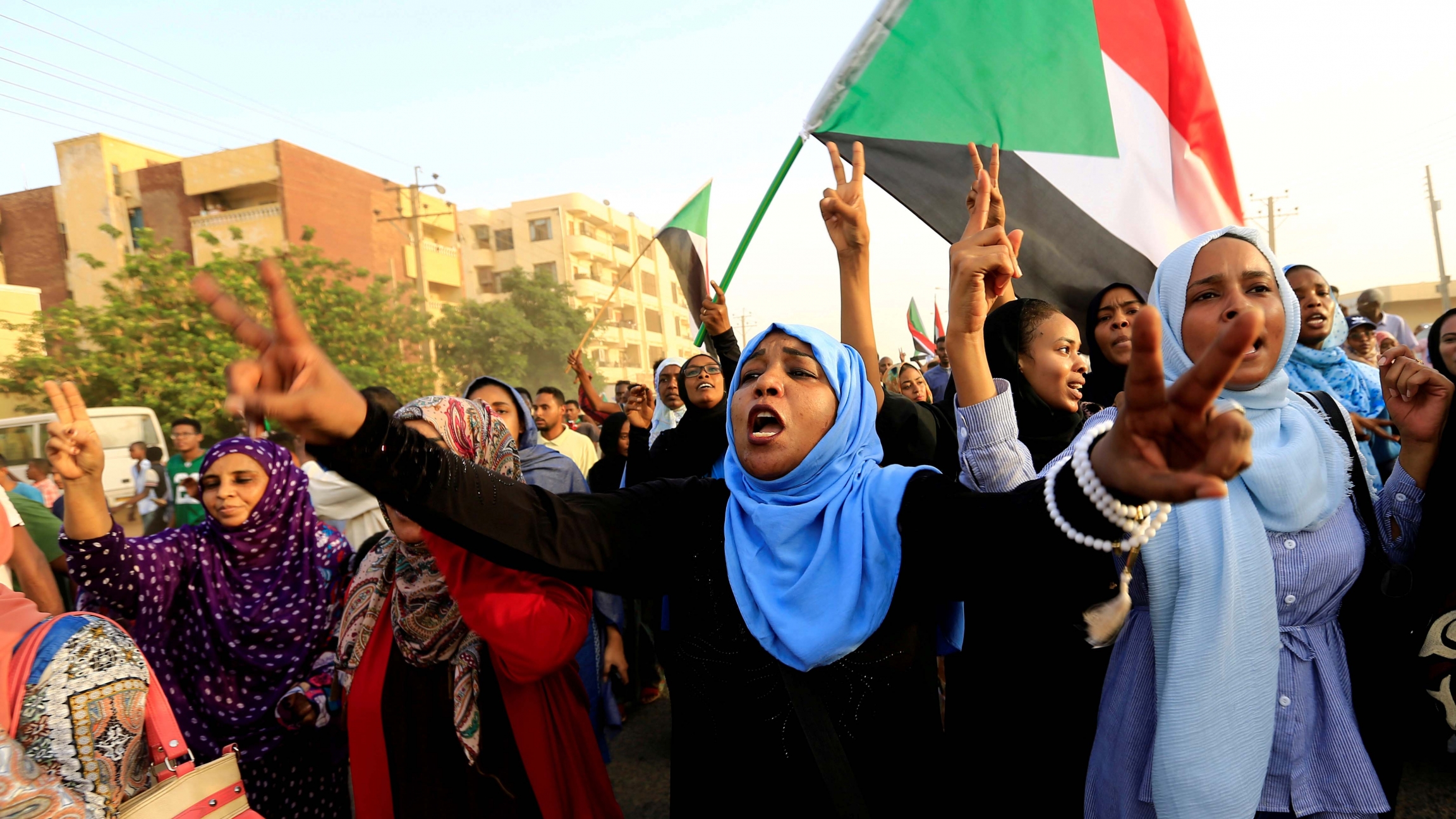 Sudanese protesters march during a demonstration to commemorate 40 days since the sit-in massacre in Khartoum North, Sudan, on July 13, 2019. Sudanese protesters march during a demonstration to commemorate 40 days since the sit-in massacre in Khartoum North, Sudan, on July 13, 2019.