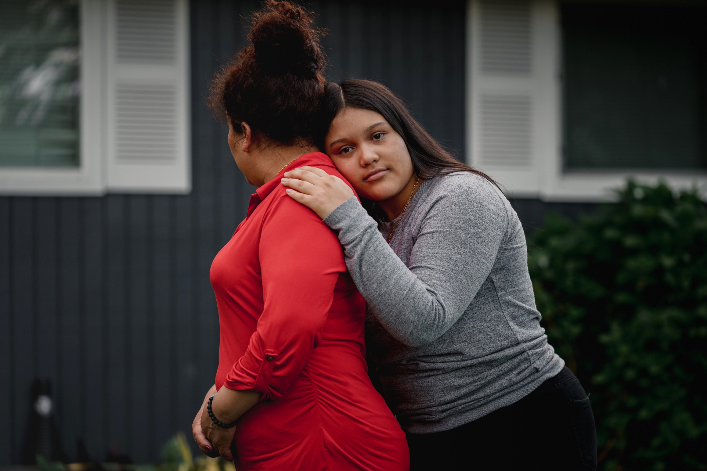 Like many young Latinos in Seattle, Michelle Aguilar Ramirez leans Democrat. But she says she feels disenchanted by the presumed Democratic presidential candidate, former Vice President Joe Biden. A young woman poses for a photo with her mother.