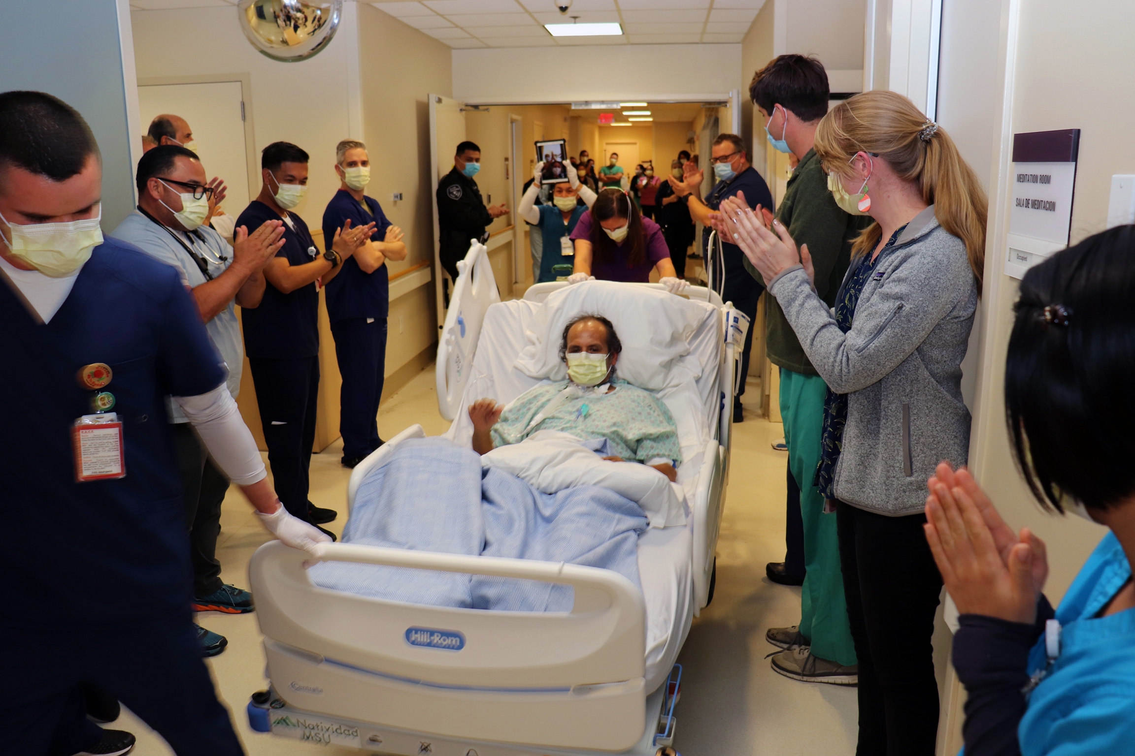 Anastacio Cruz, center, a farmworker, leaves Natividad Medical Center in Salinas, California, where he spent more than six weeks after contracting the coronavirus, on June 29, 2020. Anastacio Cruz, center, a farmworker, leaves Natividad Medical Center in Salinas, California, where he spent more than six weeks after contracting the coronavirus, on June 29, 2020.