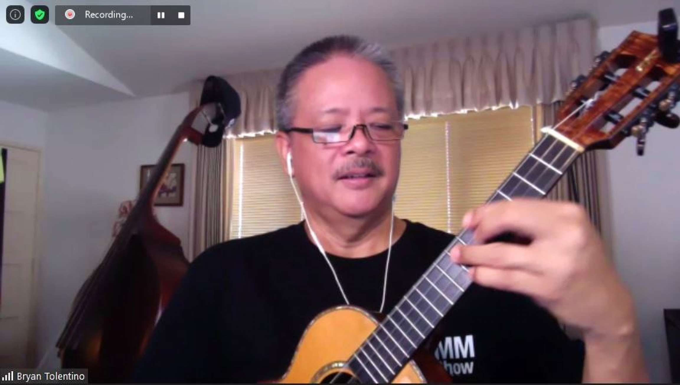 A Zoom screenshot of ukulele teacher Brian Tolentino playing “Somewhere Over the Rainbow.” A Zoom screenshot of ukulele teacher Brian Tolentino playing “Somewhere Over the Rainbow.”