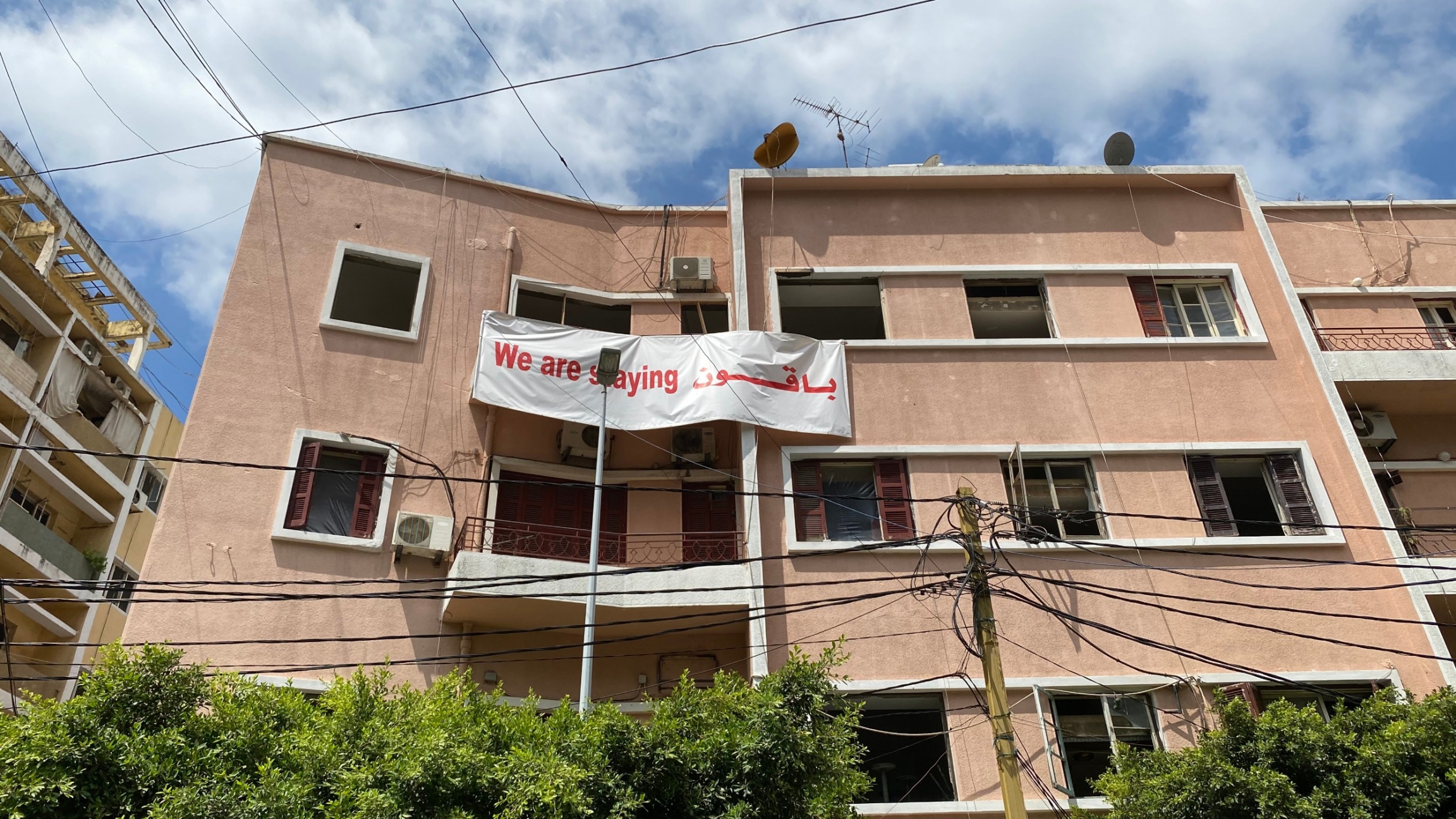 Defiant signs in a part of Beirut beset by rumors that developers are trying to push residents out. Defiant signs in a part of Beirut beset by rumors that developers are trying to push residents out.