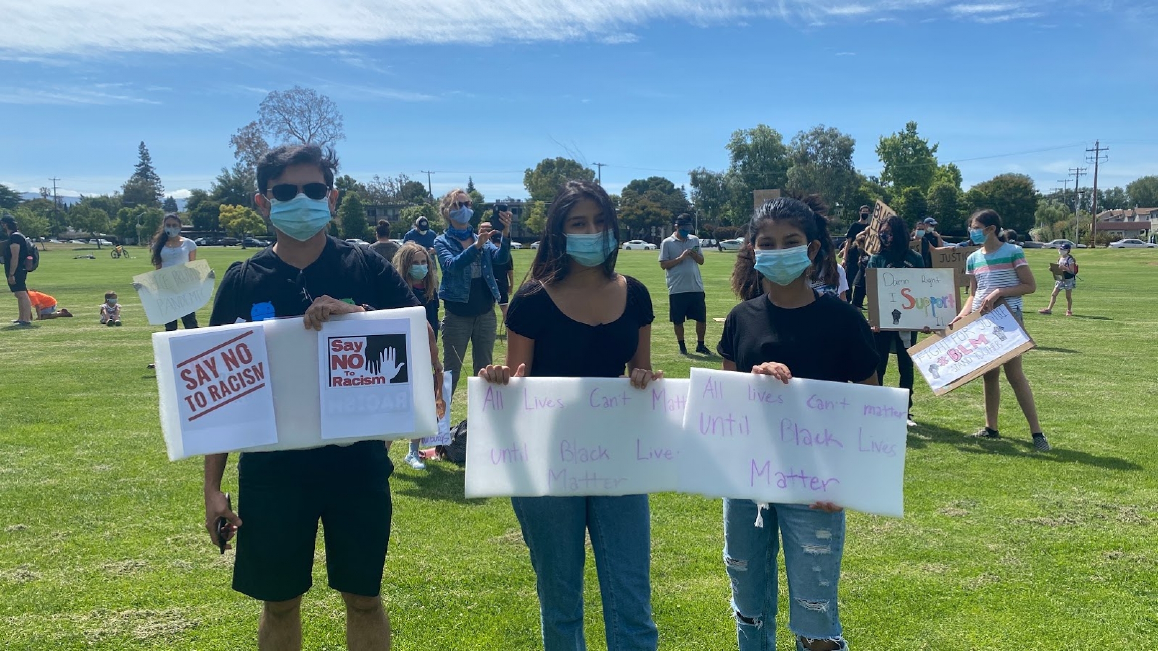 Nilesh Junnarkar, left, Esha Junnarkar, center, and Anushka Junnarkar take part in a racial justice protest organized by Indian American groups in Palo Alto, California, on June 5, 2020. Nilesh Junnarkar, left, Esha Junnarkar, center, and Anushka Junnarkar take part in a racial justice protest organized by Indian American groups in Palo Alto, California, on June 5, 2020.