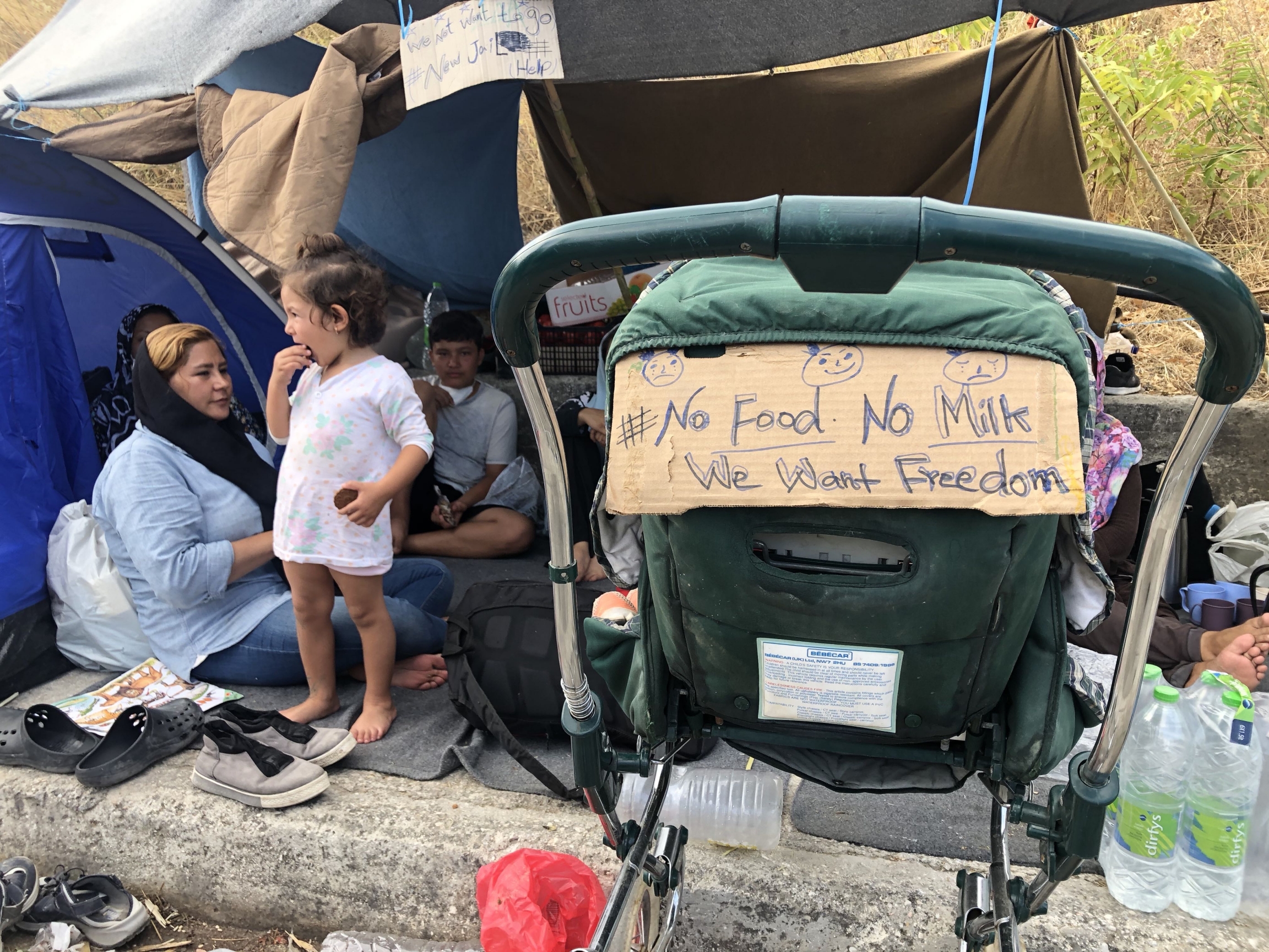 Many of the migrants displaced by the fire at Moria camp on the Greek island of Lesbos have been living on the side of the road and in fields. Many of the migrants displaced by the fire at Moria camp on the Greek island of Lesbos have been living on the side of the road and in fields.