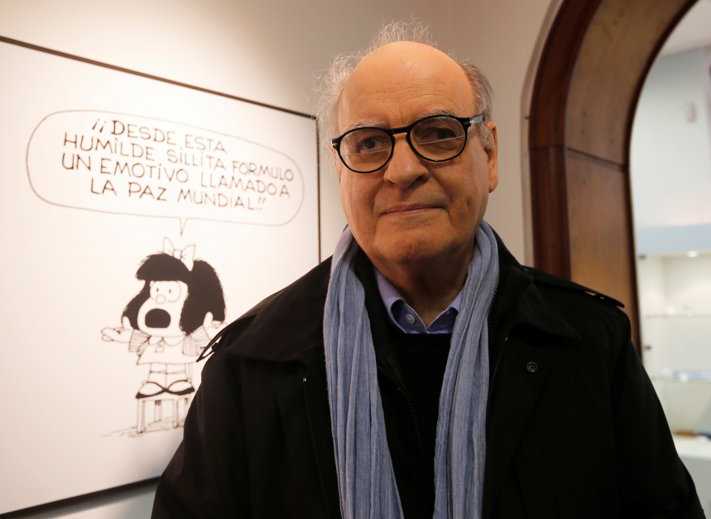 Argentine cartoonist Joaquín Salvador Lavado, also known by his pen name Quino, poses in front of an image of his most famous comic character Mafalda during the opening ceremony of the exhibition of his works at the Museo del Humor in Buenos Aires, June 1 Argentine cartoonist Joaquín Salvador Lavado, also known by his pen name Quino, poses in front of an image of his most famous comic character Mafalda during the opening ceremony of the exhibition of his works at the Museo del Humor in Buenos Aires, June 1