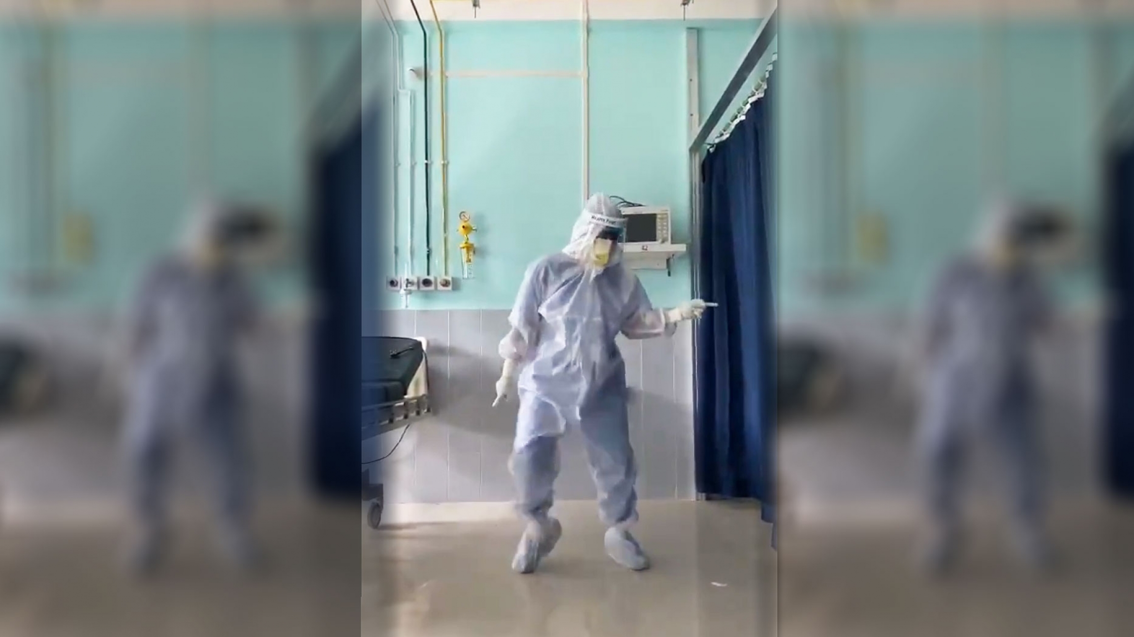 Dr. Arup Senapati, an surgeon at Silchar Medical College in northeastern India dances to the hit song “Ghungroo” for his COVID-19 patients. Dr. Arup Senapati is shown in full medical personal protective equipment and dancing in a hospital.