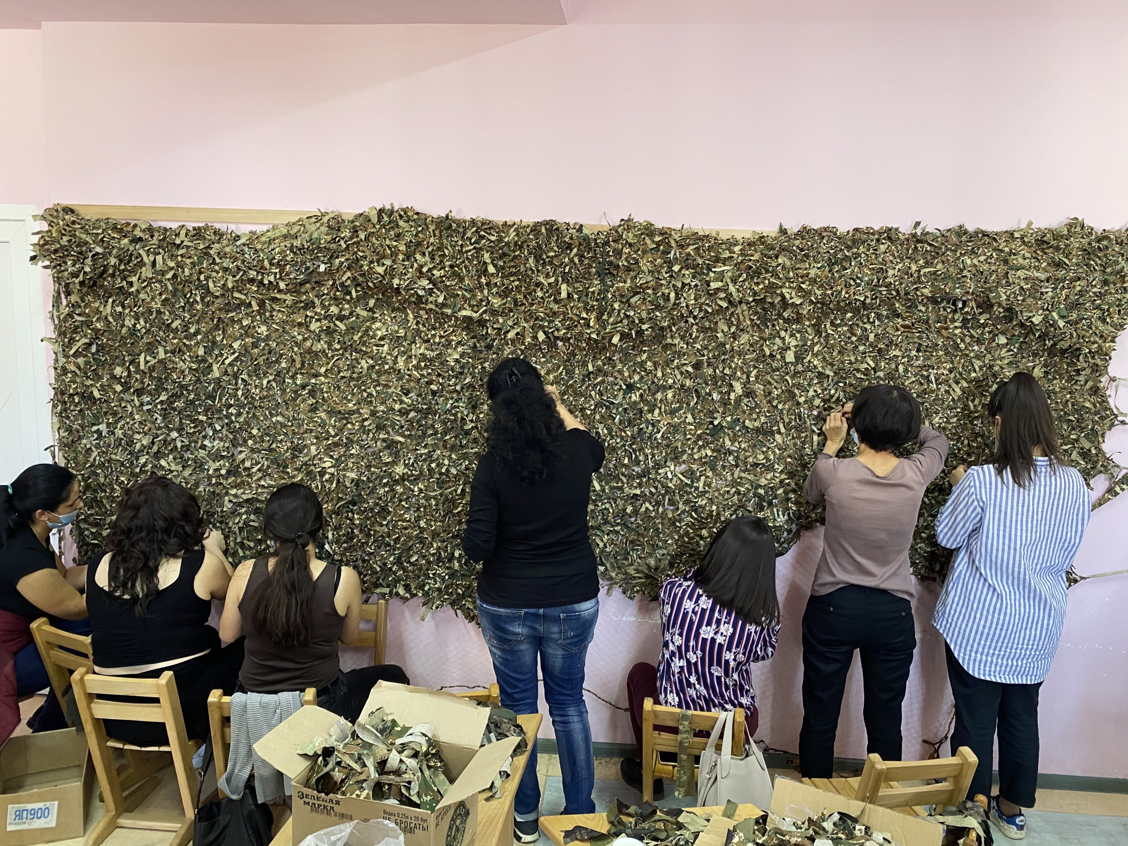 Women volunteers construct camouflage nets to be used on the Nagorno-Karabakh frontlines. Women volunteers construct camouflage nets to be used on the Nagorno-Karabakh frontlines.