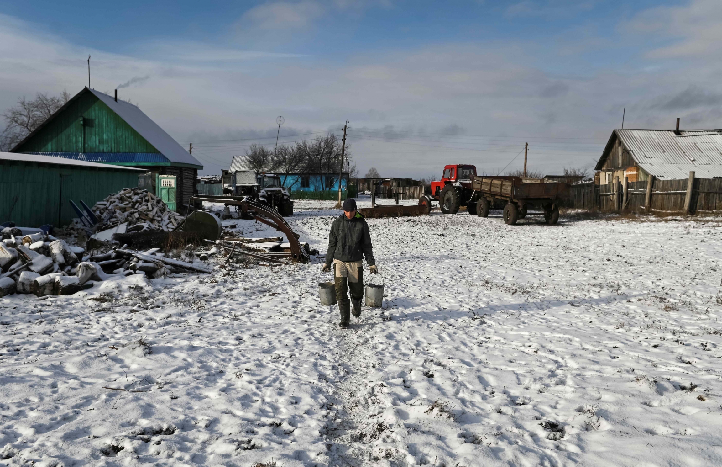 21-year-old student Alexei Dudoladov also works on his family’s farm in Stankevich, Russia. Student Alexei Dudoladov, 21, also works on his family’s farm.