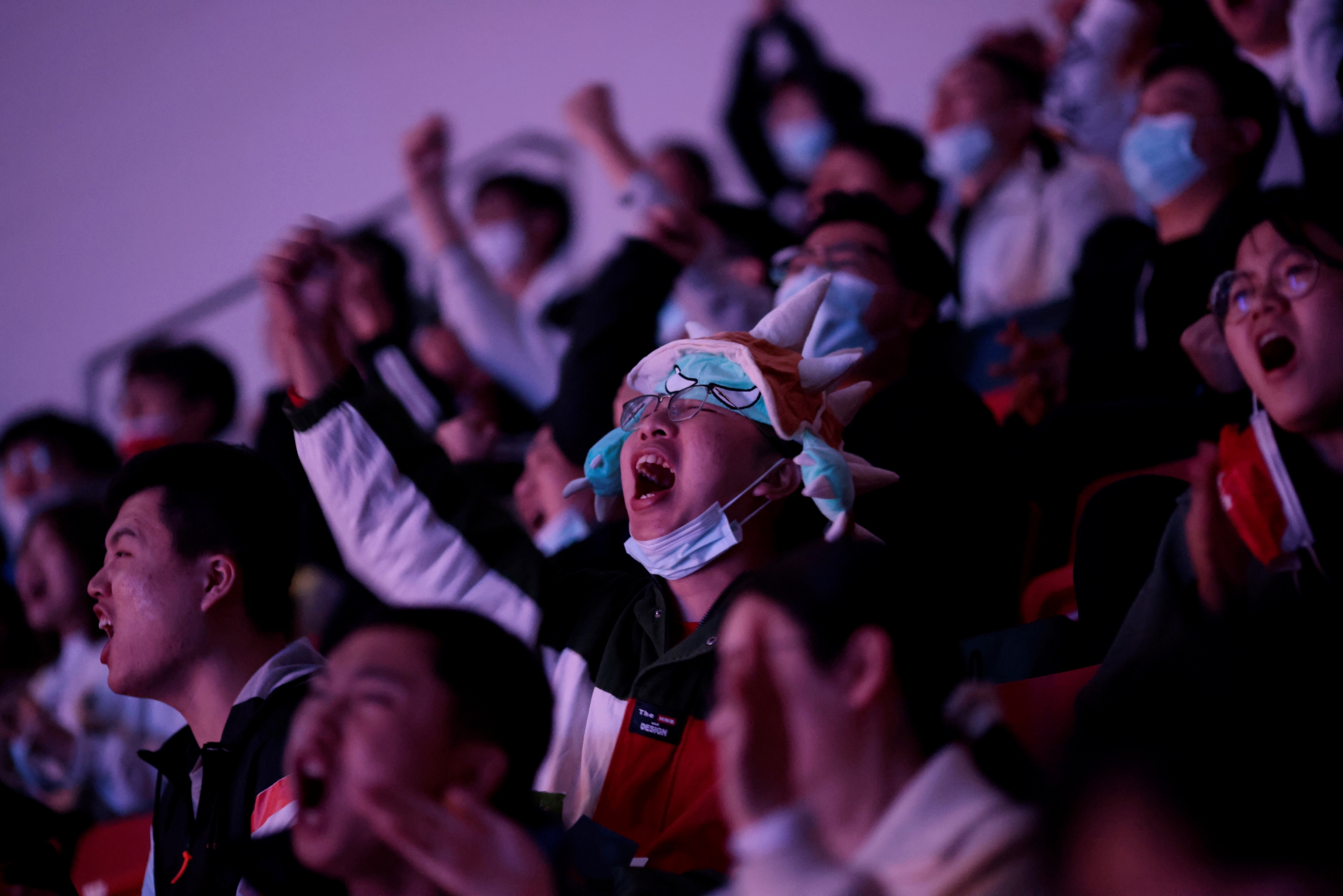 Fans react at the League of Legends (LOL) World Championship Finals, in Shanghai, China, Oct. 31, 2020. Fans react at the League of Legends (LOL) World Championship Finals, in Shanghai.