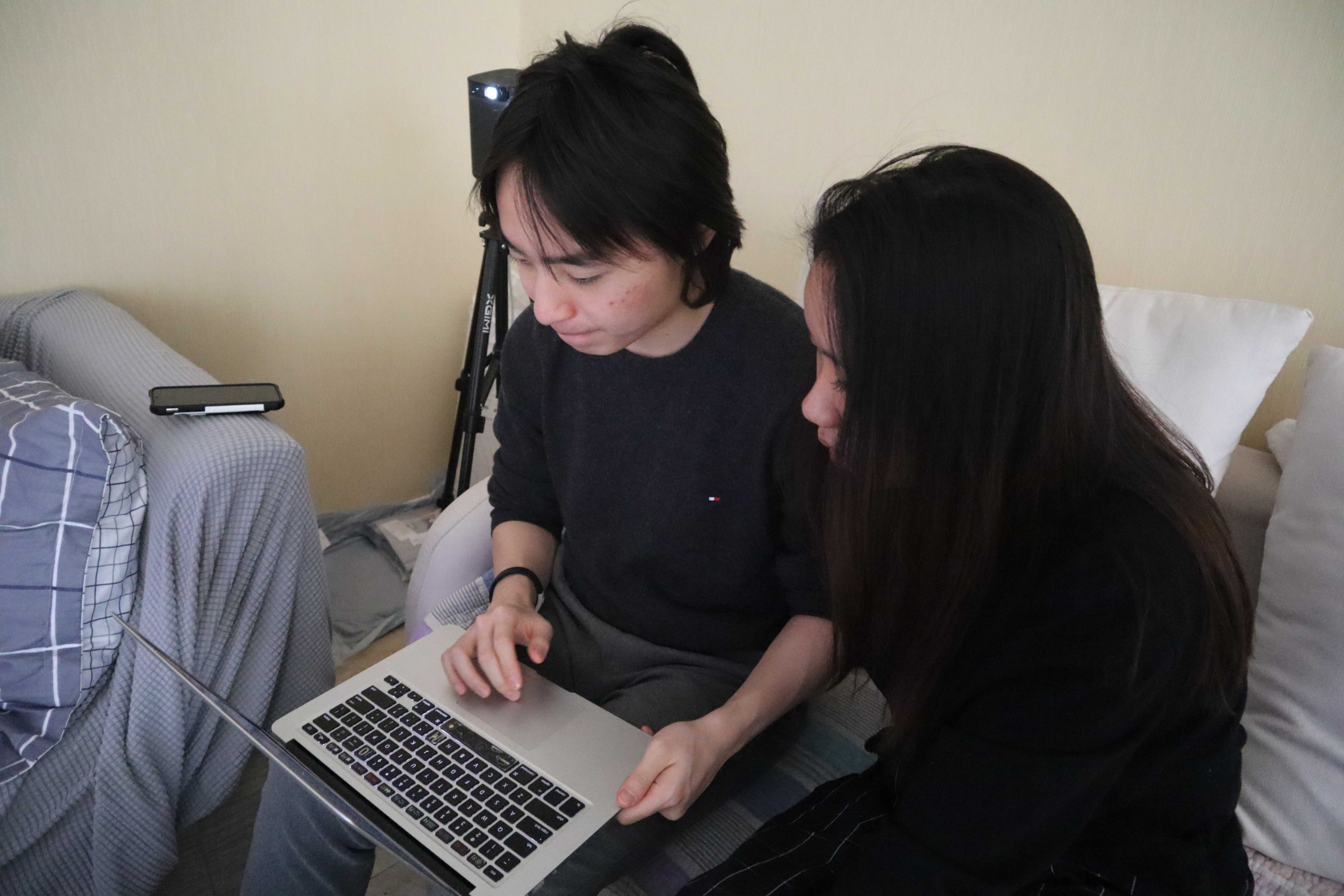 Bowen Zheng, left, a philosophy major at Wake Forest University in North Carolina, is staying the Hangzhou co-living community. Bowen Zheng, left, a philosophy major at Wake Forest University in North Carolina, is staying the Hangzhou co-living community.