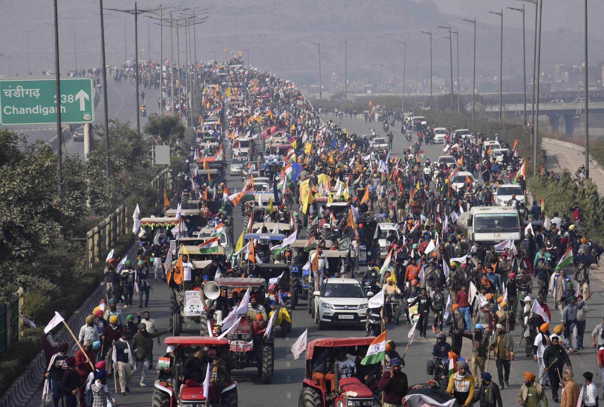 Farmers participate in a protest march towards the capital during India's Republic Day celebrations in New Delhi, India, Tuesday, Jan. 26, 2021. Farmers participate in a protest march towards the capital during India's Republic Day celebrations in New Delhi, India, Tuesday, Jan. 26, 2021.
