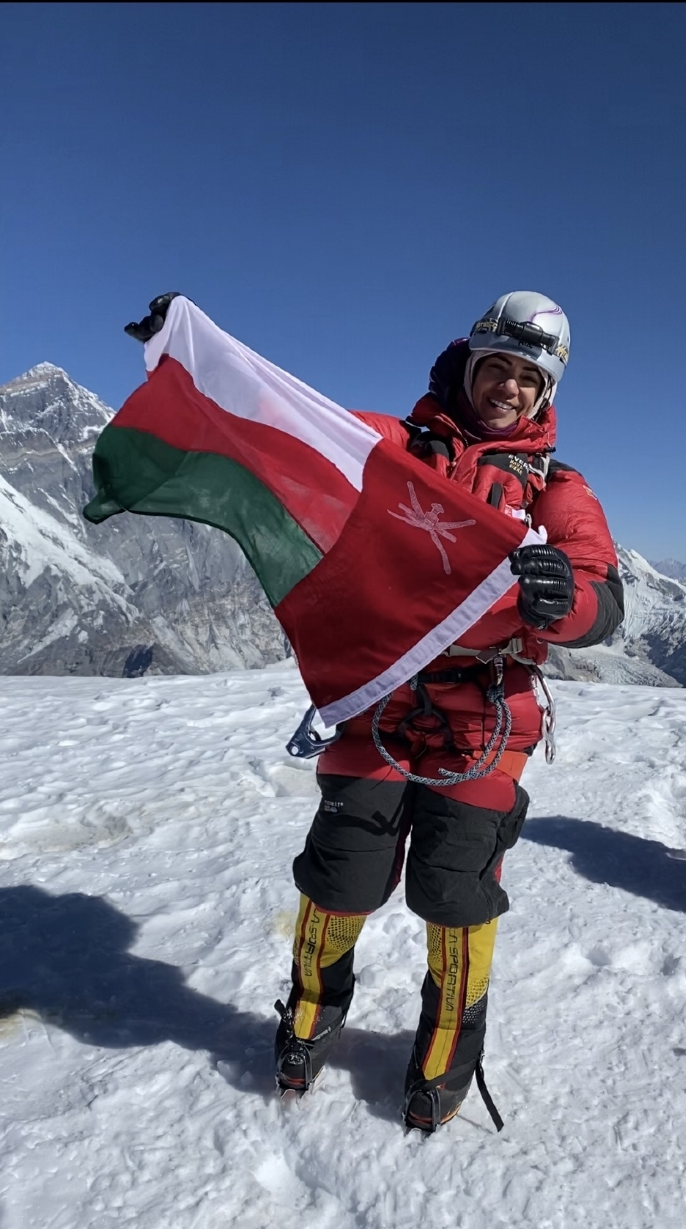 Omani climber Nadhira al-Harthy at the summit of Mt. Ama Dablam in Nepal on Jan. 14, 2021. Omani climber Nadhira al-Harthy at the summit of Mt. Ama Dablam in Nepal on Jan. 14, 2021.